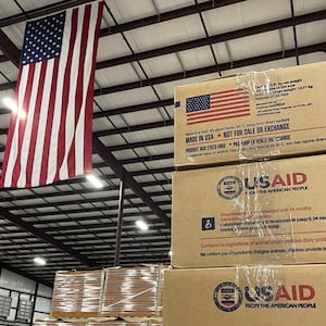 Boxes of Ready-to-Use Therapeutic Food (RUTF) at the Mana Nutrition plant in Fitzgerald, Georgia waiting to be shipped on March 3, 2025 after contracts with the US Agency for International Development (USAID) were abruptly canceled last week. The USAID contracts were reinstated late Sunday night. (Photo by John Falchetto / AFP) (Photo by JOHN FALCHETTO/AFP via Getty Images)