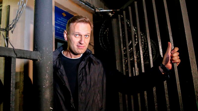 Navalny leaving a police station after yet another arrest in 2017.