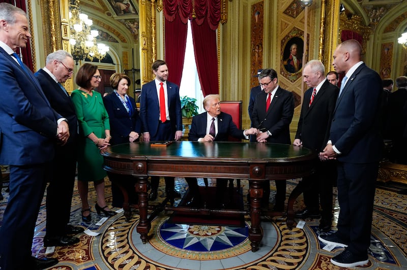 U.S. President Donald Trump takes part in a signing ceremony after his inauguration on January 20, 2025 in the President's Room at the U.S. Capitol in Washington, DC. Also in attendance are: Senate Majority Leader Sen. John Thune (R-S.D.), Senate Minority Leader Sen. Chuck Schumer (D-N.Y.), Sen. Deb Fischer (R-NE), Sen. Amy Klobuchar (D-MN), Vice President JD Vance, Melania Trump, House Speaker Mike Johnson (R-LA), House Majority Leader Steve Scalise (R-LA) and House Minority Leader Hakeem Jeffries (D-NY).