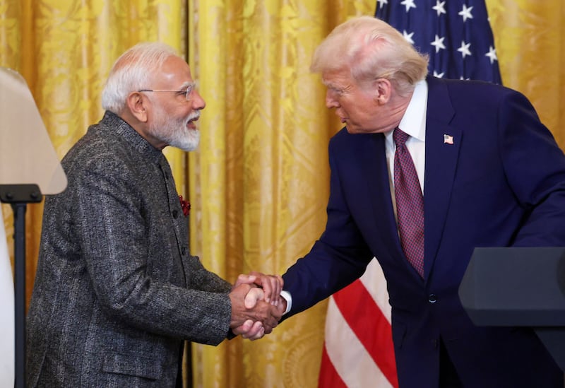 U.S. President Donald Trump and Indian Prime Minister Narendra Modi shake hands as they attend a joint press conference at the White House in Washington, D.C., U.S., February 13, 2025.