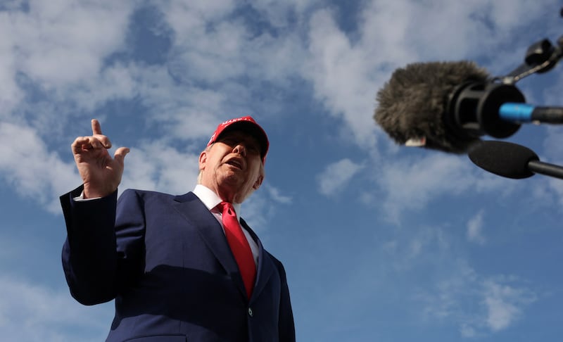 President Donald Trump speaks to reporters upon arrival in West Palm Beach, Florida on February 16, 2025.