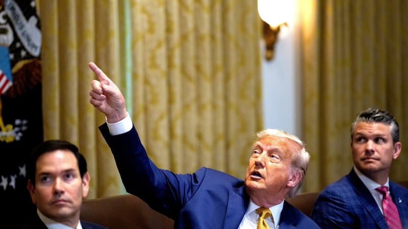 WASHINGTON, DC - JULY 08: U.S. President Donald Trump, accompanied by U.S. Secretary of State Marco Rubio (L) and U.S. Defense Secretary Pete Hegseth (R), discusses his decorating of the Cabinet Room during a cabinet meeting at the White House on July 08, 2025 in Washington, DC. Trump discussed the recent flash flooding tragedy in Central Texas where at least 109 people have died, and other topics during the portion of the meeting that was open to members of the media. (Photo by Andrew Harnik/Getty Images)
