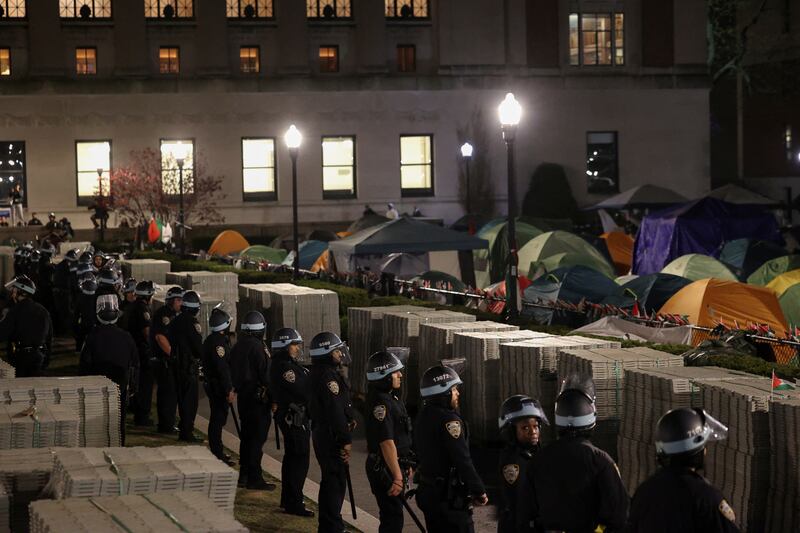 Police surround an encampment of pro-Palestinian protestors at Columbia last year.