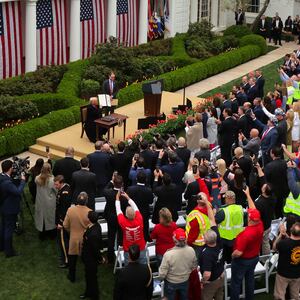 U.S. President Donald Trump holds a signed executive order, on the day of his remarks on tariffs in the Rose Garden at the White House in Washington, D.C., U.S., April 2, 2025. REUTERS/Carlos Barria