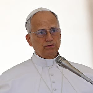 Pope Leo XIV blesses to the crowd during the weekly general audience at St Peter's Square at the Vatican on May 28, 2025.