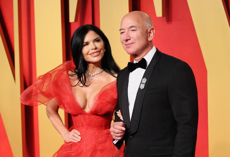 Lauren Sanchez and Jeff Bezos arrive at the Vanity Fair Oscars after-party following the 96th Academy Awards in Beverly Hills on March 10, 2024.