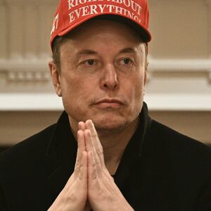 Elon Musk looks on as US President Donald Trump hosts a cabinet meeting in the Cabinet Room of the White House on March 24, 2025, in Washington, DC. (Photo by Brendan SMIALOWSKI / AFP) (Photo by BRENDAN SMIALOWSKI/AFP via Getty Images)