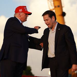 Donald Trump stands with Sen. Marco Rubio (R-FL) during a rally at the Miami-Dade County Fair and Exposition