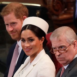 Awkward much? Meghan, Duchess of Sussex sits with Prince Harry and Prince Andrew at a  2019 church service.