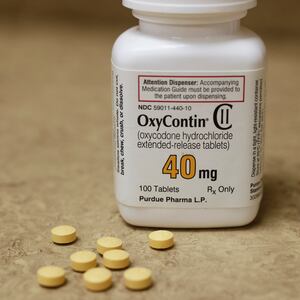 A bottle of prescription painkiller OxyContin, 40mg pills, made by Purdue Pharma L.D. sit on a counter at a local pharmacy, in Provo, Utah