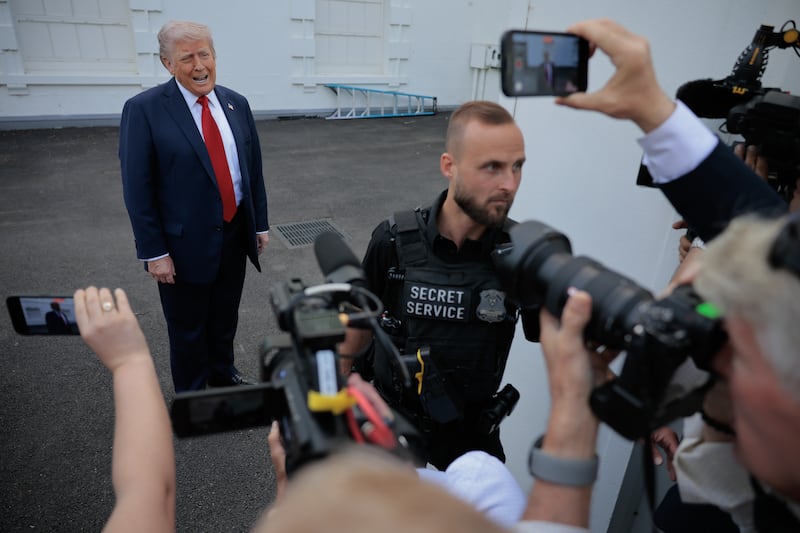 WASHINGTON, DC - APRIL 23: U.S. President Donald Trump talks to reporters after inspecting the North Lawn with members of the White House grounds crew to look for a place to put a 100-foot-tall flag pole on April 23, 2025 in Washington, DC. He said that he wants to put two 100-foot flag poles, one on the North Lawn and another on the South Lawn. (Photo by Chip Somodevilla/Getty Images)