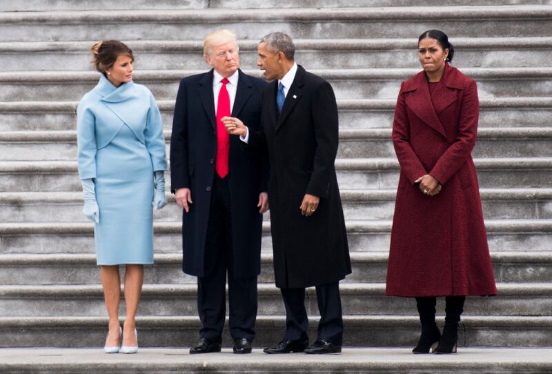 From left, First Lady Melania Trump, President Donald Trump, former President Barack Obama, and former First Lady Michelle Obama talk on the steps of the U.S. Capitol as the Obamas prepare to leave Washington following the swearing in of Donald Trump as the 45th President of the United States on Friday, Jan. 20, 2017.