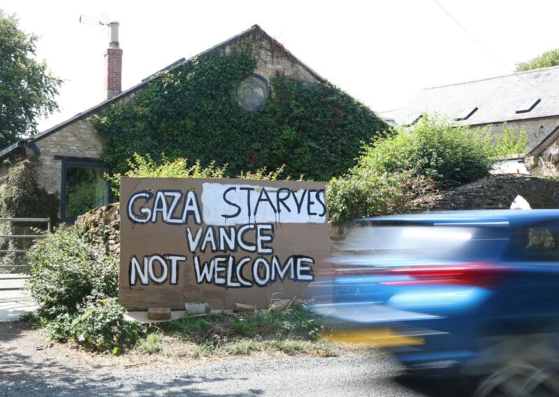 A protest message is displayed at a roadside property, whilst U.S. Vice President JD Vance spends his holiday nearby, near Chipping Norton, Cotswolds, Britain, August 12, 2025. REUTERS/Toby Melville