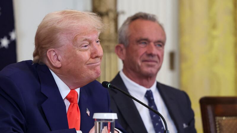 U.S. President Donald Trump and Health and Human Services (HHS) Secretary Robert F. Kennedy Jr. attend a Make America Healthy Again (MAHA) Commission event, in the East Room of the White House in Washington, D.C., U.S., May 22, 2025. REUTERS/Evelyn Hockstein