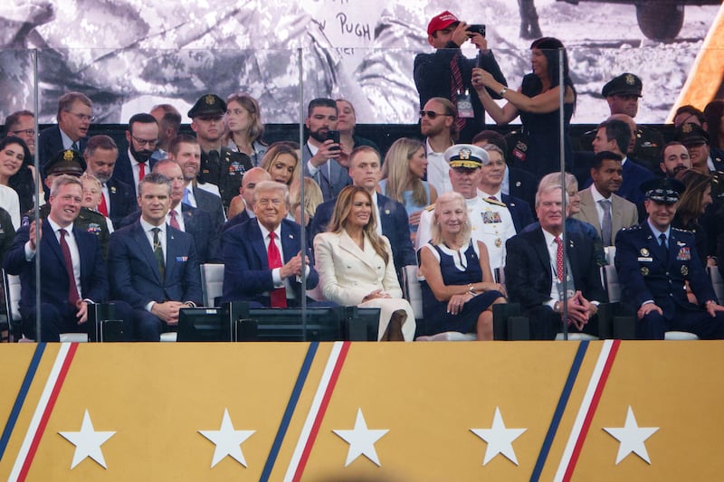 Daniel Driscoll, secretary of the Army, left, Pete Hegseth, Secretary of defense, President Donald Trump, and First Lady Melania Trump  watch during the U.S. Army's 250th birthday parade on June 14, 2025 in Washington, DC.