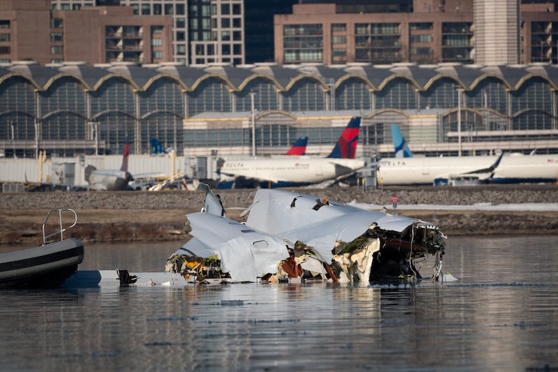 Photo of Debris of the collision of American Eagle flight 5342 and a Black Hawk helicopter that crashed into the Potomac River, near Reagan Washington National Airport in Washington D.C.