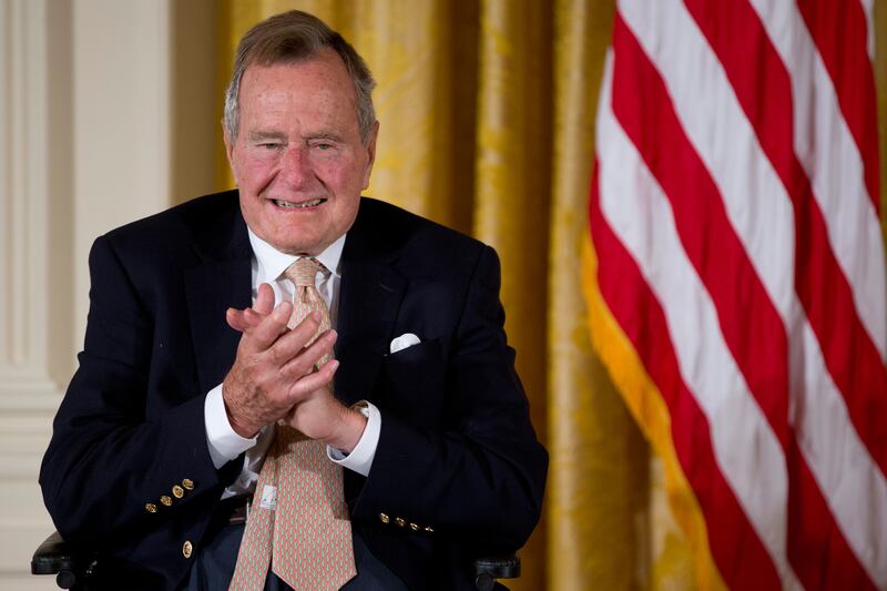articles/2013/10/20/the-twilight-vindication-of-george-h-w-bush/131018-undergrove-bush-tease_bnmovl