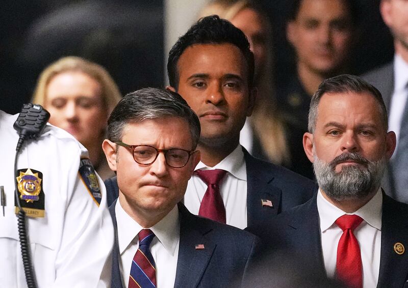 Mills next to Speaker of the House Mike Johnson (R-LA) and former presidential candidate Vivek Ramaswamy in May 2024.
