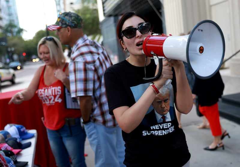 TAMPA, FLORIDA - OCTOBER 05: Laura Loomer shows her support for former President Donald Trump outside a campaign event for Republican presidential candidate Florida Gov. Ron DeSantis at The Vault on October 05, 2023 in Tampa, Florida. Ron DeSantis held the campaign event with Florida sheriffs after receiving endorsements from 60 bipartisan Florida law enforcement officers.  (Photo by Joe Raedle/Getty Images)