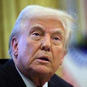 A close-up of Donald Trump's face after the president signed an executive order in the Oval Office in March 2025.