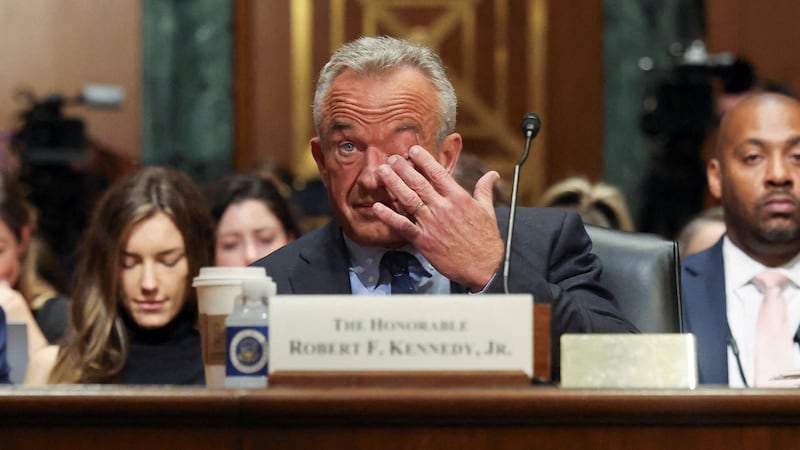 U.S. Health and Human Services Secretary Robert F. Kennedy Jr., rubs his eye as he attends to testify before a Senate Finance Committee hearing on President Donald Trump's 2026 health care agenda, on Capitol Hill in Washington, D.C., U.S., September 4, 2025. REUTERS/Jonathan Ernst     TPX IMAGES OF THE DAY