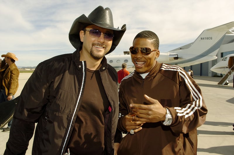 After recording their mega hit "Over and Over," Tim McGraw and Nelly hooked up again, this time to film a Budweiser commercial that may appear during the Super Bowl. (Photo by L. Cohen/WireImage)