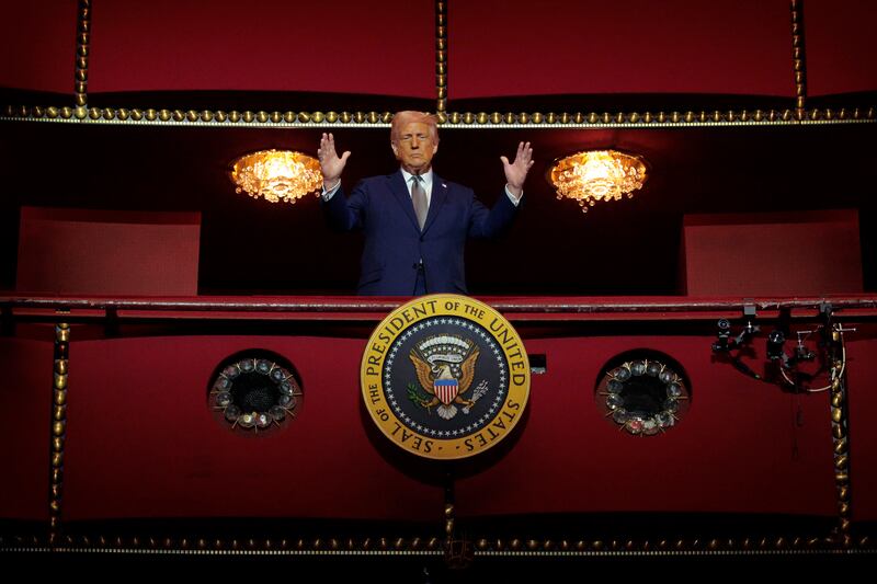 President Donald Trump looks down from the Presidential Box in the Opera House at the John F. Kennedy Center for the Performing Arts