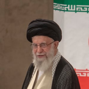 Iranian Supreme Leader Ayatollah Ali Khamenei waves as he arrives to vote for the presidential runoff election on July 5, 2024 in Tehran, Iran. The second round of Iran's presidential elections was held while no candidate won the majority of votes in the first round of elections last month. In the second round, Saeed Jalili, who is known as a radical candidate, faced Masoud Pezeshkian, a reformist candidate.