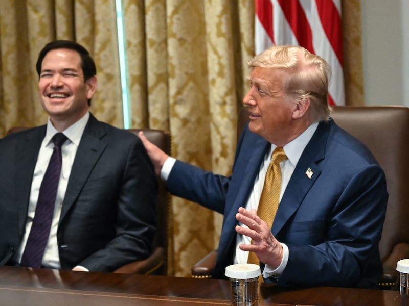 US President Donald Trump pats Secretary of State Marco Rubio on the shoulder during a cabinet meeting in the Cabinet Room of the White House in Washington, DC, on July 8, 2025. (Photo by ANDREW CABALLERO-REYNOLDS / AFP) (Photo by ANDREW CABALLERO-REYNOLDS/AFP via Getty Images)