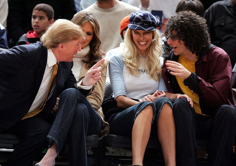 Donald Trump, Melania Trump, Beth Ostrosky and Howard Stern (Photo by James Devaney/WireImage)