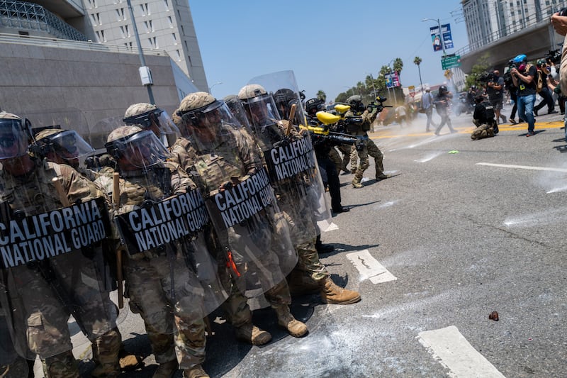 Demonstrators protest outside a downtown jail in Los Angeles following two days of clashes with police during a series of immigration raids on June 08, 2025 in Los Angeles, California.