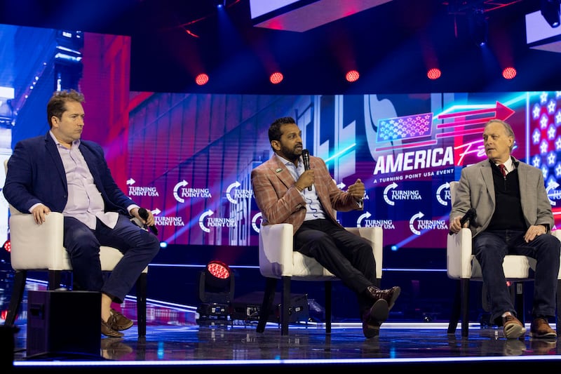 A panel with (L-R) Darren Beattie, Kash Patel, and Andy Biggs, discusses the Twitter files, and what they say is malfeasance by the FBI. Turning Point USA's "AmFest 2022" continued its general sessions on Monday, Dec. 19. 2022 in Phoenix, Arizona, with speeches by many of the most prominent figures in the extreme right wing of American conservatism. Their themes included standard culture-war fare of Christian nationalism, rigid gender definitions and roles, gun rights, election fraud, attacks on liberals, and opposition to Covid science. (Photo by John Rudoff/Sipa USA)(Sipa via AP Images)