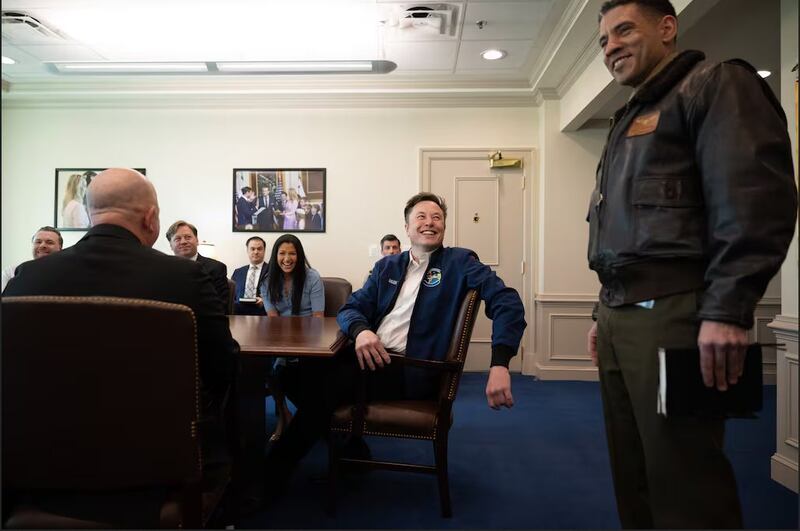 Elon Musk in a Pentagon briefing room