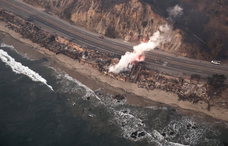 Homes destroyed in Malibu as the Palisades Fire continues to burn.