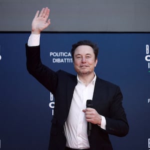 Tesla and SpaceX's CEO Elon Musk gestures, as he attends political festival Atreju organised by Italian Prime Minister Giorgia Meloni's Brothers of Italy (Fratelli d'Italia) right-wing party, in Rome,