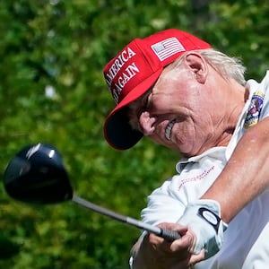 Former US President and 2024 presidential hopeful Donald Trump plays golf ahead of the LIV Golf Invitational series  tournament at Trump National Golf Club Bedminster in Bedminster, New Jersey, on August 9, 2023.