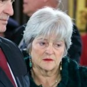 Martha-Ann Alito stands next to her husband at a funeral.