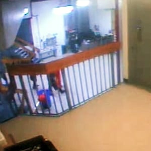 CCTV footage from inside the Metropolitan Correctional Centre shows Jeffrey Epstein in an orange jumpsuit being escorted by guards.