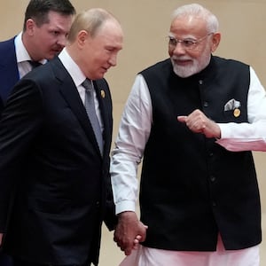 Indian Prime Minister Narendra Modi walks next to Russian President Vladimir Putin during the Shanghai Cooperation Organization (SCO) Summit 2025 at the Meijiang Convention and Exhibition Centre in Tianjin, China, September 1, 2025.    SUO TAKEKUMA/Pool via REUTERS