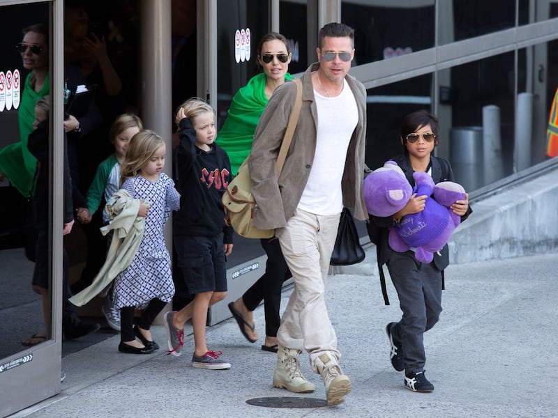 Brad Pitt and Angelina Jolie with their children, Pax Jolie-Pitt, Shiloh Jolie-Pitt, Vivienne Jolie-Pitt and Knox Jolie-Pitt in 2014.