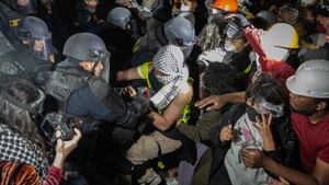 Demonstrators occupy a Pro-Palestinian encampment at UCLA as authorities breach and break up the encampment on Thursday, May 2, 2024 in Los Angeles, CA.