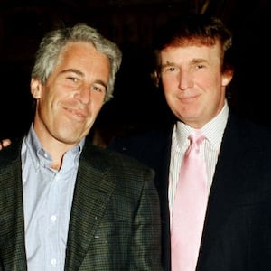 Portrait of American financier Jeffrey Epstein (left) and real estate developer Donald Trump as they pose together at the Mar-a-Lago estate, Palm Beach, Florida, 1997.(Photo by Davidoff Studios/Getty Images)