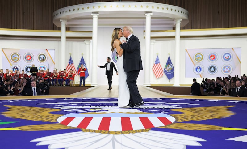 U.S. President Donald Trump and his wife First Lady Melania Trump dance at the Commander in Chief Ball