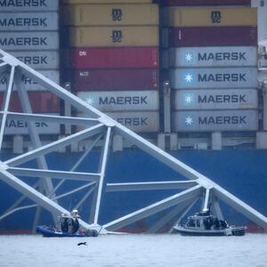 Emergency diver teams work at the site of the wreckage of the Dali cargo vessel, which crashed into the Francis Scott Key Bridge causing it to collapse, in Baltimore, Maryland, U.S., March 27, 2024. 