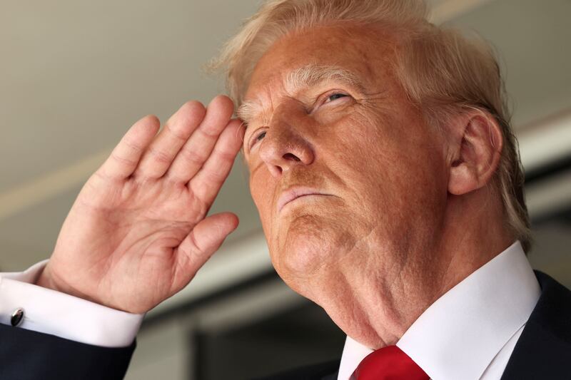 U.S. President Donald Trump salutes as he attends the FIFA Club World Cup final at the MetLife Stadium in East Rutherford, New Jersey, U.S., July 13, 2025. REUTERS/Kevin Lamarque