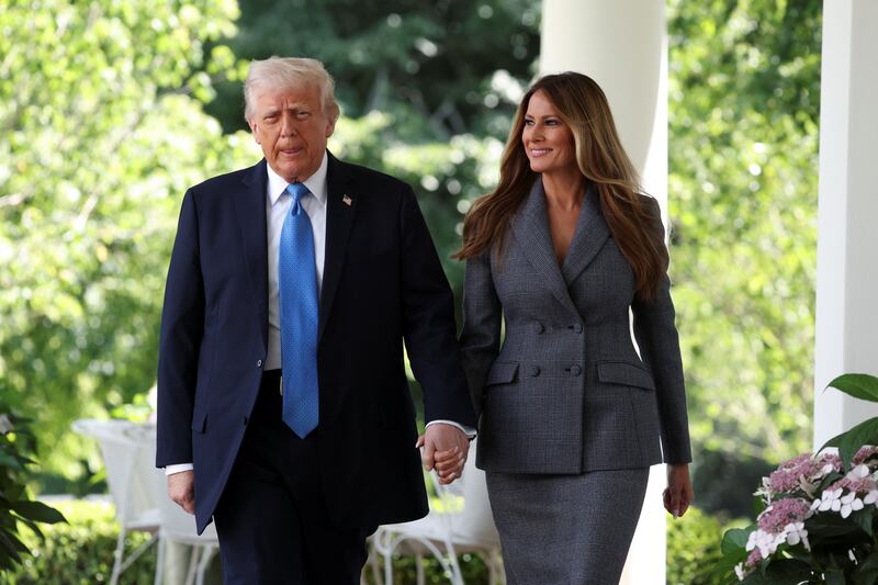 President Donald Trump walks to the Rose Garden of the White House for a signing ceremony on May 19 after speaking to Russian President Putin that morning.