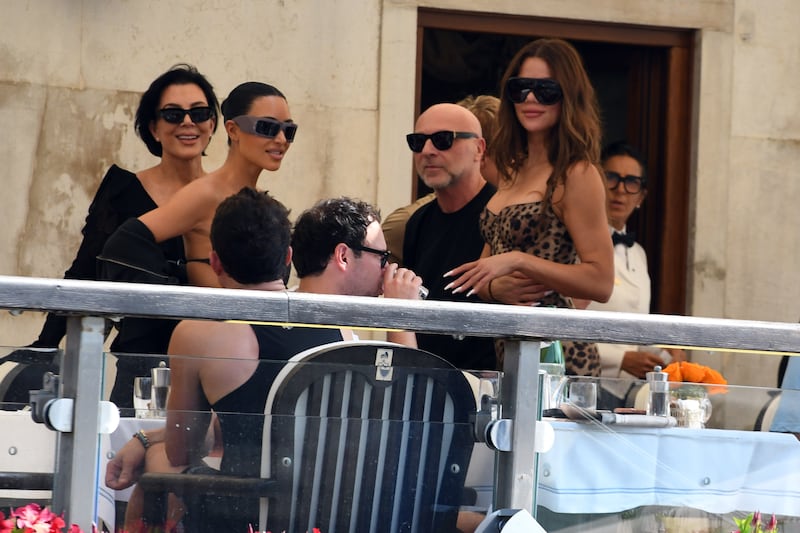 Kris Jenner, left, with Kim, billionaire fashion designer Domenico Dolce, and Khloé on Thursday.