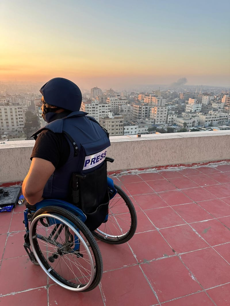 Momen Fayez surveys the damage of Gaza City during the Israeli bombardment.
