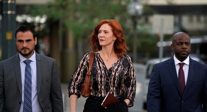 Publicist Tree Paine arrives at Denver Federal Court.
