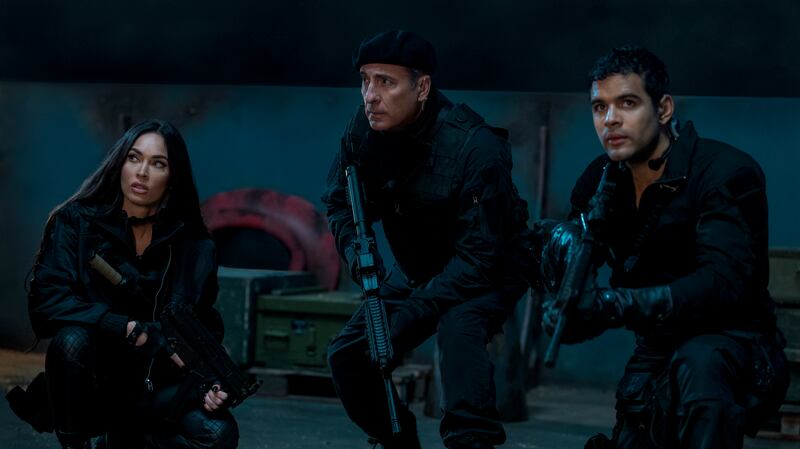 Photo still of Megan Fox as Gina, Andy Garcia as Marsh and Jacob Scipio as Galan in The Expendables 4